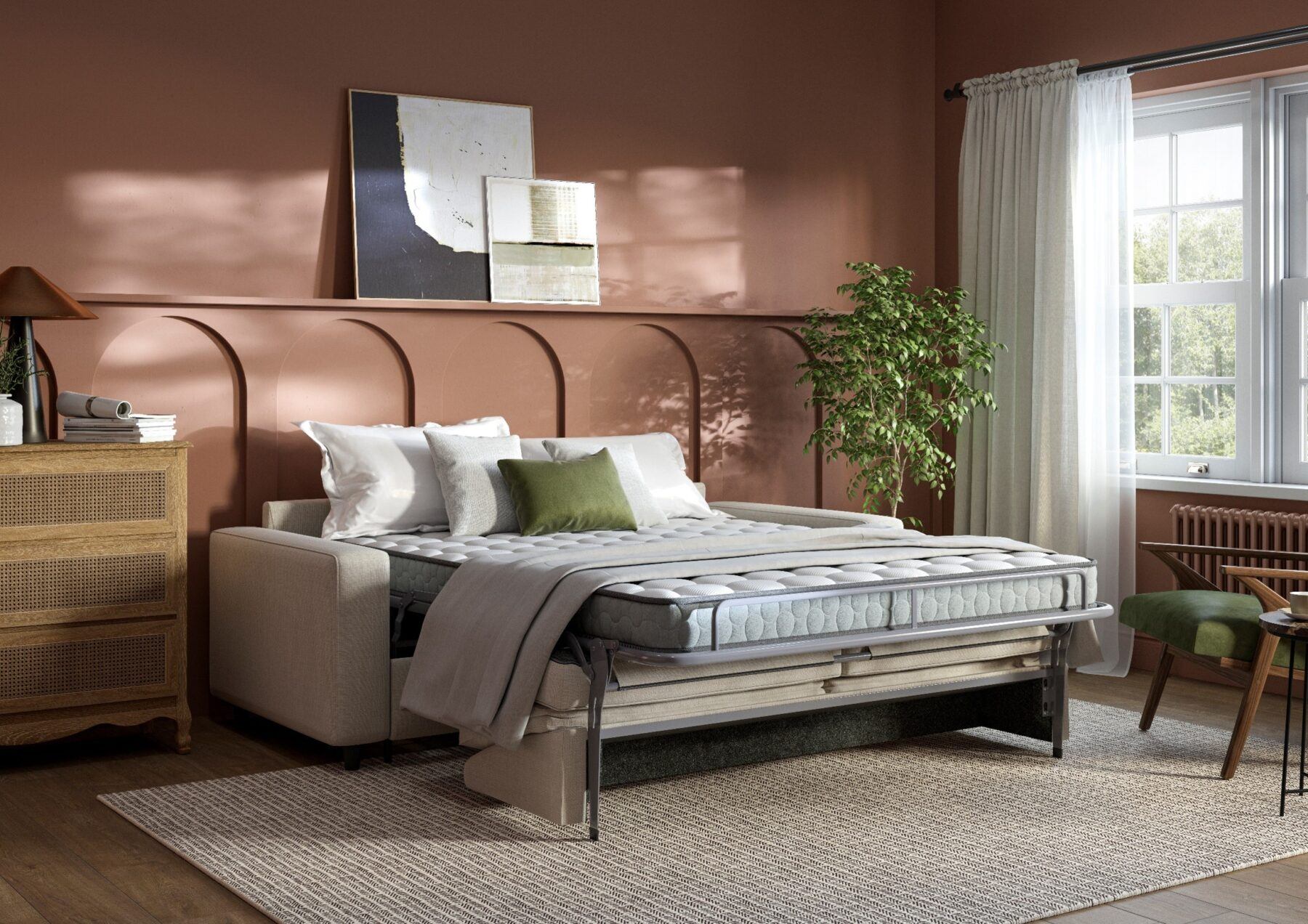 A natural coloured sofa bed pictured in a terracotta room